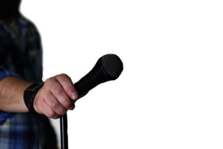 microphone on stage hand holdの写真素材