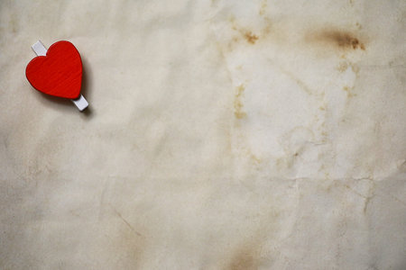 white sheet of paper love notes and heart shapeの写真素材