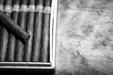 monochrome photo of large wooden box of cigars handmade Cuban productionの写真素材