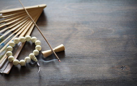 Different objects with traditional religious oriental on a wooden background