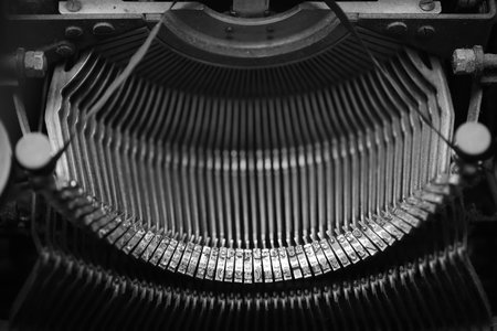 Different small metal elements of an old typewriter macro