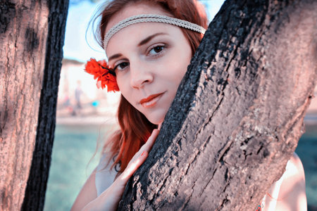 Girl on a spring sunny afternoon for a walk in the parkの写真素材