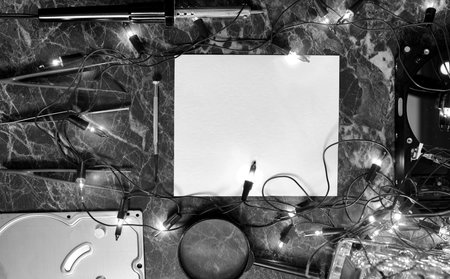 clean sheet of paper on work desktop with tools