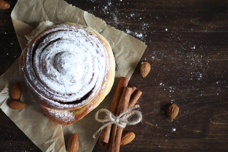 Delicious fresh pastry pie with cinnamon and fruitの写真素材