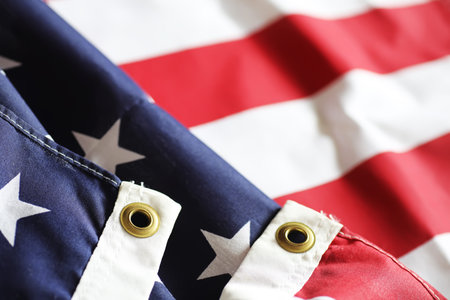 American flag on a wooden texture table and space for text