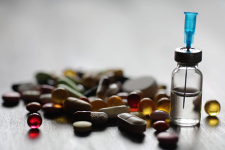 Ampoule and needles from a medical syringe