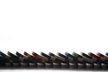 Card game using chips on a wooden tableの写真素材