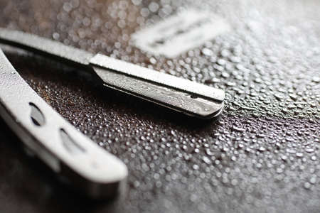 Shaving accessories on a wooden backgroundの写真素材