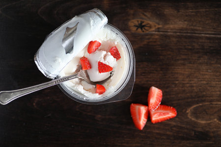 Yoghurt with fresh strawberries and cherriesの写真素材