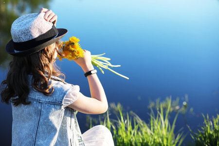 Girl in the park in the springの写真素材