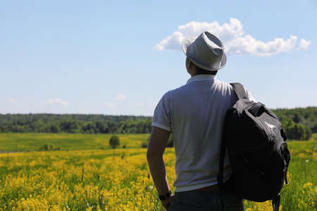 Young man travels with a backpackの写真素材