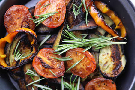 Summer vegetables grilled pan fried eggplant and tomatoesの写真素材