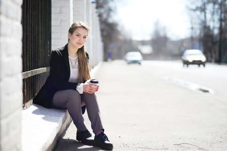 Girl in the city park for a walkの写真素材