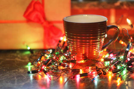 christmas table fruits and drinks with color garland backgroundの写真素材