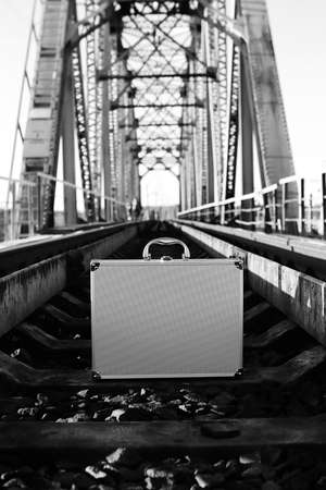 monochrome photo of a silver metal case with money transfer conceptの写真素材