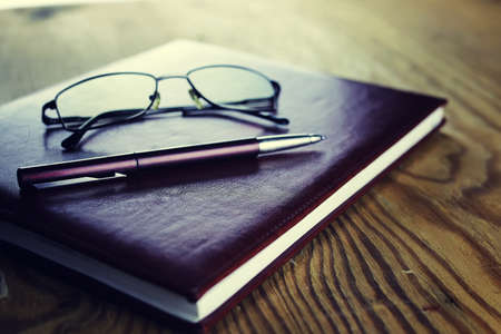business pen glasses notebookの写真素材