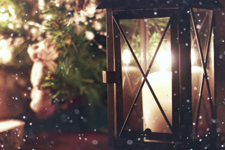 dark candle lantern holiday snow fairyの写真素材