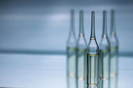 transparent vials of medicineの写真素材