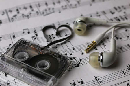 notes background and headphonesの写真素材