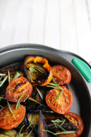 Summer vegetables grilled pan fried eggplant and tomatoesの写真素材