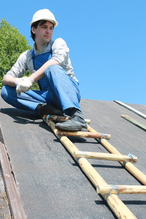 a man in the form of a builderの写真素材