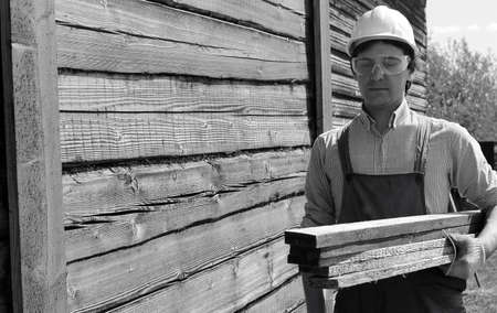 man in workers clothes black and whiteの写真素材