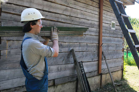 a man in the form of a builderの写真素材