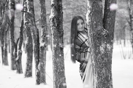 A girl in a winter cloudy day