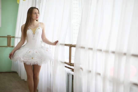 Pretty girl ballet dancer practicingの写真素材