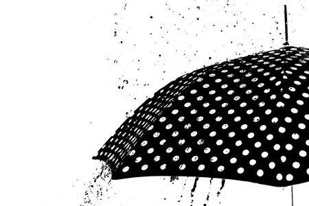 Rain drops on an umbrella isolated on the white backgroundの写真素材