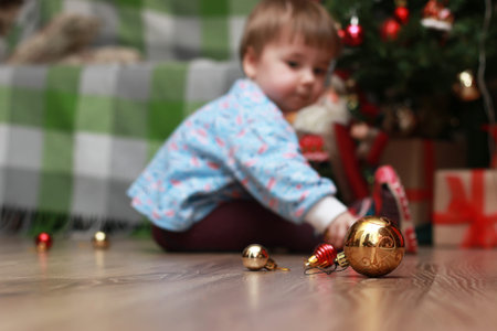 Little children near a Christmasの写真素材