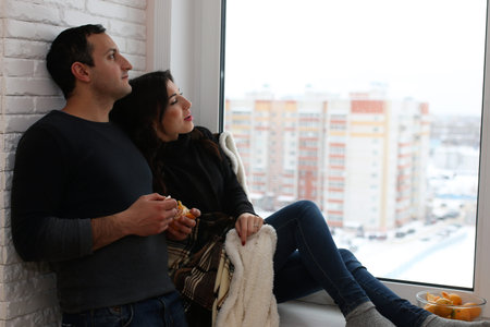 A young married couple in a new apartment