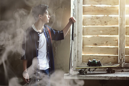 A young person with a baseball bat