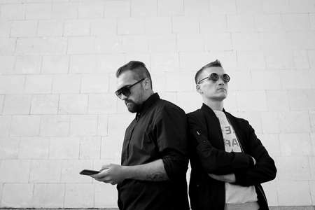 Two men in the street black and whiteの写真素材