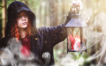 Witch ritual in a forestの写真素材