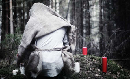 Fairy magician. A sorcerer with a glass sphere, a magical spellの写真素材