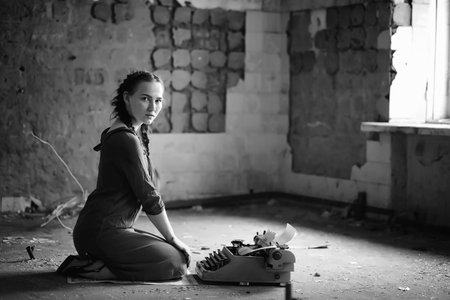 Retro girl in the old house reading books