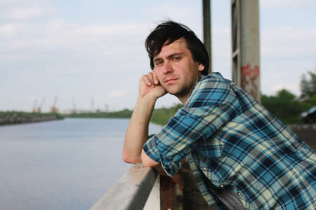 Man with a beard in the industrial zoneの写真素材