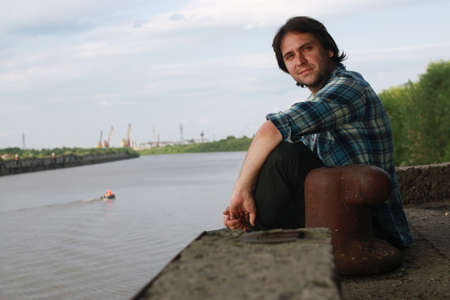 Man with a beard in the industrial zoneの写真素材