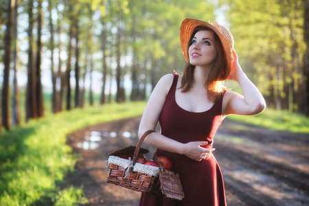 A girl at the countryside in the eveningの写真素材