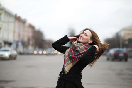 French woman for a walk in early springの写真素材
