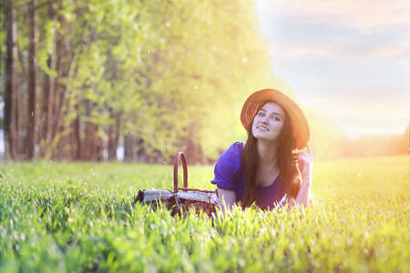 Girl in the countryside in the eveningの写真素材