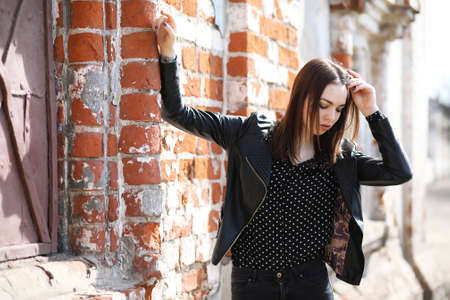 A girl going for a walk in the city in springの写真素材