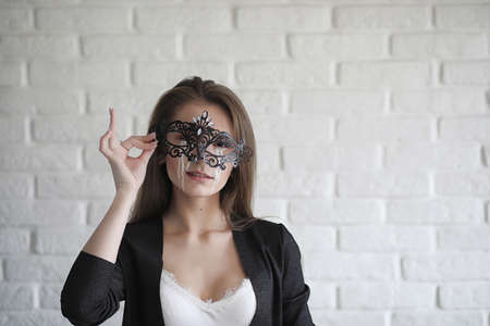 Beautiful girl with tears in her eyes. Young girl with painted tearsの写真素材