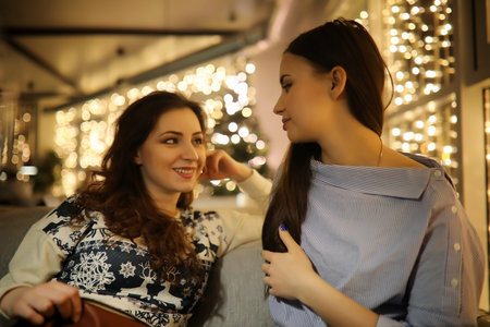 The girl in the evening rest in a cafeの写真素材