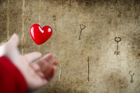 conceptual photo hand stretching for one of the many old vintageの写真素材