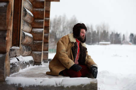 Traditional winter costume of peasant medieval age in russiaの写真素材