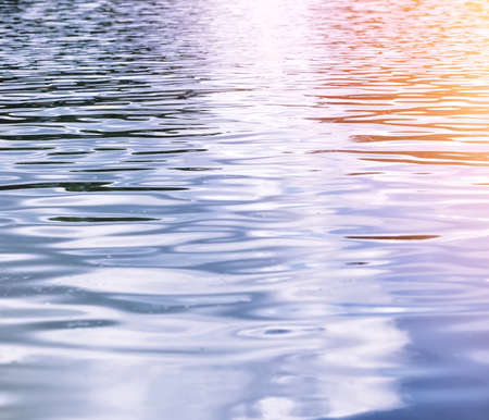 Landscape lake. Texture of water. The lake is at dawn. The mouth of the river at the confluence of lake.の写真素材