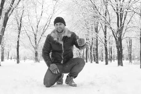 A man in winter clothes on the streetの写真素材