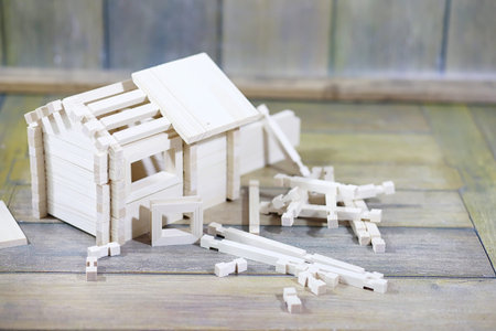 Toy wooden house. The constructor is made of natural wood for chの写真素材